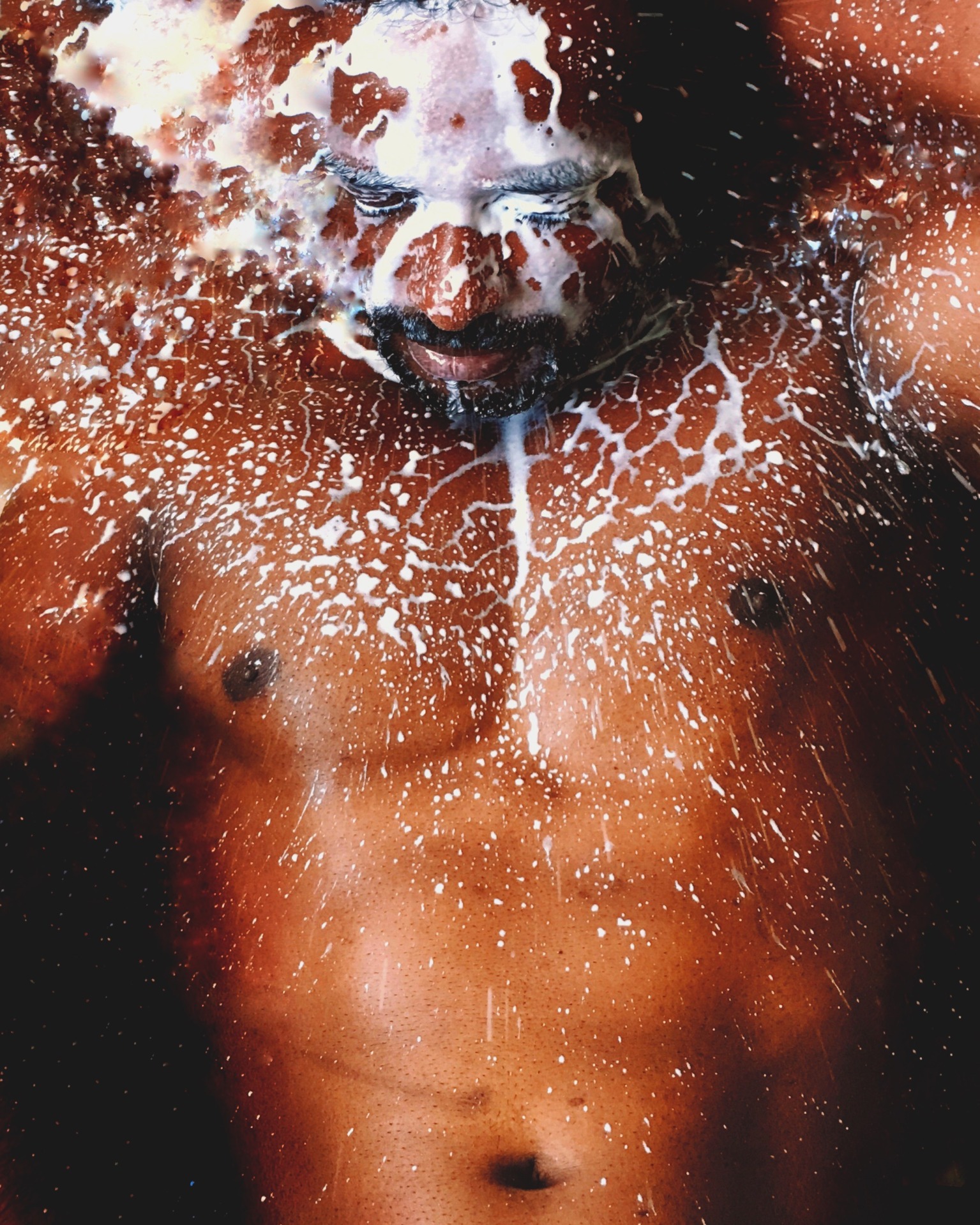 Indian model covered in milk, surreal portrait.
